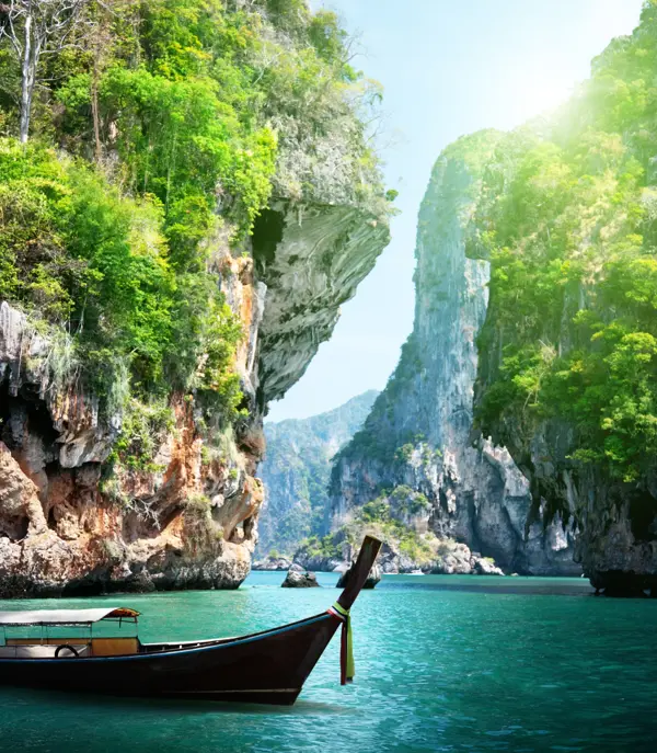 Thai Long Boat And Rocks On Railay Beach In Krabi, Thailand Shutterstock 125319602