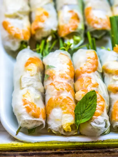Roundtrip-Vietnam-South-Vietnam-Phu-Quoc-Day1-2-Saigon-Ho Chi Minh City-Vietnamese-Springrolls-GettyImages-587809098-1.jpg